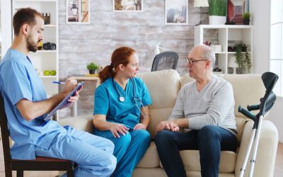 team-male-female-nurses-talking-with-old-retired-man-bright-cozy-nursing-home_482257-20741